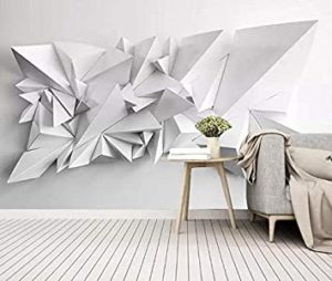Origami como arte exposto numa parede.